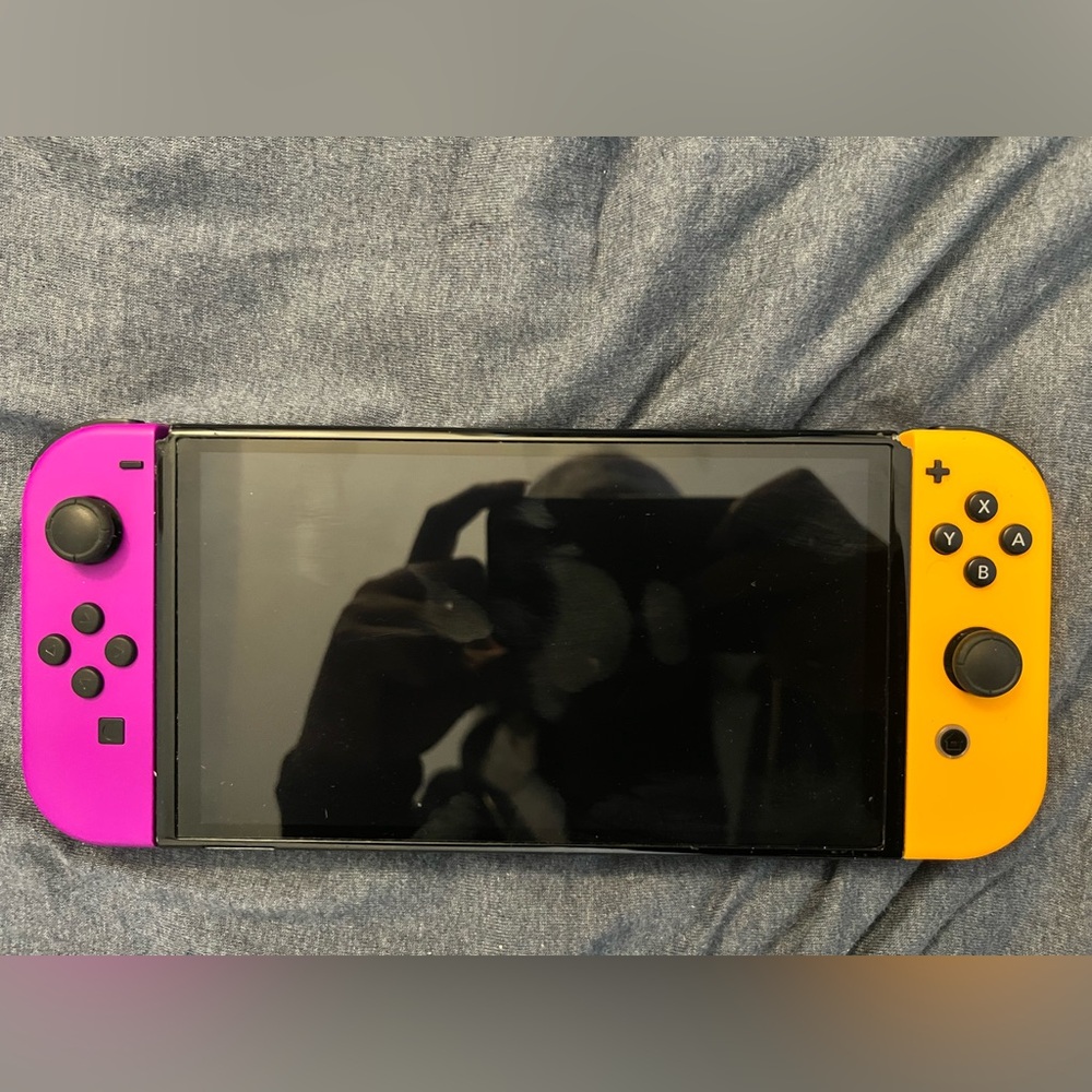 Nintendo Switch Oled Model With Joy Con, Neon Pink and Neon Orange Controllers